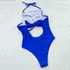 Kvinnors badkläder mager fast färg sommar halter midja ihålig bodysuit baddräkt strandkläder bikini