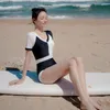 Women's Swimwear Wisuwore 2024 South Korean Swimsuit Conservative One Piece Bikini Short Sleeve Triangle Black White Matching