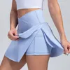 Mulheres esportes saia curta 2 em 1 yoga shorts lado garfo fitness correndo tênis badminton anti exposição saia ginásio roupas esportivas 240304