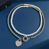 Designer Tiffanybracelet Jóias T Família Titânio Aço cravejado de diamante pingente em forma de coração com miçangas de pérolas de camada dupla prata de fivela de fivela Tren