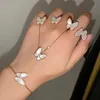 Collier en V blanc Fritillaria papillon collier femme en argent sterling plaqué or rose 18 carats pendentif collier chaîne plein diamant bague noeud lumière luxe bracelet