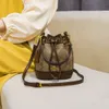Hot European and American Designer Bag Factory Online Wholesale Retail French Bucket for Women New Womens Fashionable Printed Crossbody High-end Texture Bag