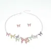Nouveau Sz0643 coloré marguerite papillon pendentif en alliage collier boucle d'oreille ensemble de bijoux pour les femmes d'été collier