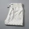 Rhude Mens Sports Shorts Rhude Shorts Eric Shorts nof nylon relained elstic oczekiwanie lato swobodny projektant wakacyjny szorty Pantaloncini Eric Manuel Shorts