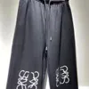 Women's elastic waist casual sports loose black color logo floral embroidery jogger pants trousers SMLXL