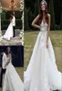 2021 Abiti da sposa Sweet Beach con scollo a cuore Illusione sexy Corpetto applicato in pizzo Una linea Tulle Corte dei treni Abiti da sposa All'aperto 2675782