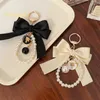 Keychains Shining U Black Bowknot Pearl Keychain Car Key Pendant Bag Accessory Gift for Women