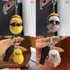 Keychains Lanyards 1PC Plush Toy Duck Keychain med nyckelring för kvinnor gåva unikt roliga kreativa färgglada djur kvinnor väska bil nyckelring ld240312