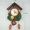 Orologi da parete a forma di casa orologio a cucù con uccello, musica in plastica, segnalazione del tempo, carillon silenzioso alimentato a batteria