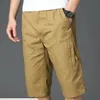 ヴィンテージの大型ポケットワークショーツ夏の男性ゆるいストレートブリーチハラジュクファッションy2k服メンズカジュアルパンツ240227