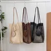 HBP Non-Brand Koreaanse versie van de nieuwe vrijetijdsstrandtas voor dames modetrend geld enkele schouderpakket creatieve mesh canvas draagtas