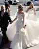 Abiti da sposa a sirena di lusso sexy Collo gioiello Maniche lunghe Illusione Applicazioni di pizzo Tulle Treno staccabile Gonna oversize Abiti da sposa formali Taglie forti