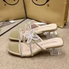 Tofflor Crystal Bow Women High Heels Transparenta skor 2024 Summer Open Toe Beach Flip Flops klänning Sandaler Pumpar Slides Femme