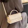 Акция на сумочку Корейская версия Минималистичная и нишевая женская сумка 2024 Весна/лето Новая маленькая квадратная сумка Lingge Высококачественная универсальная сумка на плечо
