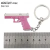 Keychains Lanyards Hot Game Keychain Jewelry Weapon Mini Gun Model Metal Pendant Key Chain Fashion Chaveiro Bag Car Key Holders Gift For Kids Men ldd240312