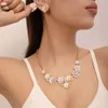 Nouveau Sz0643 coloré marguerite papillon pendentif en alliage collier boucle d'oreille ensemble de bijoux pour les femmes d'été collier