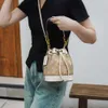Hot European och American Designer Bag Factory Online Wholesale Retail Ny Boutique Old Flower Bucket Bag For Womens Printed Crossbody Fashionable Mortile Bag