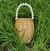 Pearl Bag Women s 2024 New Knitted Handbag Instagram Grass Weaving Vine Crossbody Internet Red Small 240312