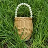 Sac de perles pour femmes, sac à main tricoté, Instagram, tissage d'herbe, vigne, bandoulière Internet rouge, petit 2024, nouvelle collection 240312