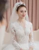 Luxurious 2024 Arabic Plus Size ball gown Wedding Dresses Backless Long Sleeves Crystals Bridal gown Stunning Wed Gowns Customize