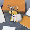 Cute Yellow Dog Model Keychain Designer Key Chains Keyring Holder Brand Designers Keychains for Holiday Gift Men Women Car Bag Pendant Accessories