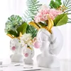 白い樹脂花瓶の植木鉢北欧スタイルかわいい人間の頭の花瓶バスケットペンブラシホルダーホームデコレーション210409306n
