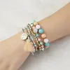 Bracciale con perline di riso in stile bohémien con bracciale multistrato con nappe a forma di moneta con testa di bellezza da 6 confezioni