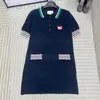 Women's Knits & Tees Designer 24 early spring new Polo neck short sleeved dress with contrasting color heart letter pattern, fashionable and slimming A-line skirt