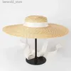 Chapéus de aba larga Bucket Chapéus Verão grande chapéu de palha de trigo natural Senhoras feitas à mão chapéu de sol de praia de aba larga Elegante top plano longo laço de fita chapéu de sol Q240312