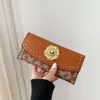 Shop Factory Wholesale Chaopai 2024 New Change Bag Camellia Long Wallet Womens Folding Rivet Hand Money Clip Card