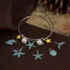 Takılar 10pcs Vintage Patina Antika Bronz Mavi Yıldız Kabuk Metal Kolyeler Diy bilezikler Kolye Kadın Partisi Mücevher Bulguları