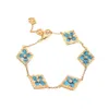 Licht klavertje vier vijf bloemen vrouwelijke literaire niche, high-end feel-armband, gouden parel, witte schelp, agaat armband