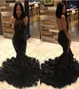 2022 Black Girl Sexy Backless Sirena Abiti lunghi da ballo Halter Illusion Tulle Applique In rilievo Strati di piume Sweep Train Evening G4236134