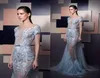 2020 Ziad Nakad Evening Dresses spetsapplikationer pärlor fjäder sjöjungfru prom klänning kort ärm avtagbar tåg specialtillfälle gow3138430