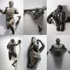 Objets décoratifs Figurines 3D à travers le mur Figure Sculpture Résine Galvanoplastie Imitation Cuivre Abstrait Salon Decoratio209b