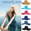 Szerokie czapki z czapki wiadra 16 kolorów solidne letnie kobiety szerokie grzbiet słomy kapelusz derby duży plażę sunhat Q240312