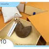 Sleutelhangers Lanyards met doos Fortune Cookie Bag Hangende sleutelhanger Autobloem Charm PU lederen sleutelhanger 243