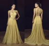 Eleganti abiti da ballo giallo chiaro con linea A Gioiello in pizzo con applicazioni di perline Abito da sera firmato con volant Abiti da sposa sexy1648610