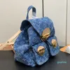 Le sac à dos 2024 Denim comporte trois sacs à rabat à serrures dorées Grand bleu Global Organic Standard toile Naturel