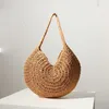 Versione coreana della borsa tessuta New Grass Borsa estiva da spiaggia per le vacanze da donna circolare ad alta capacità a spalla singola portatile 240312