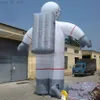 Casco grigio vivido all'ingrosso Body White Body Posa Posa Modello di personaggio astronaut gonfiabile con sacca spaziale sul retro Made in Cina per