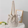 Hollow Single Shoulder Cotton Thread Woven Bag Ny handhållen blommorgräs Turism Vacation Beach 240312