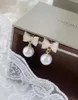 Stud Earrings Bow Shaped Pearl With A Sophisticated And Temperament Light Luxury Exquisite Niche Ear Clips