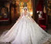 Robes de mariée de luxe en dentelle arabe perlée robes de mariée brillantes manches longues chapelle robe de bal Vintage mariage robe De Novia4380588