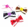 Vêtements de chien 100pc / lot chat cheveux arcs petits accessoires fleurs roses toilettage bandes de caoutchouc233h