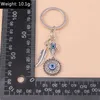 Keychains Lanyards 1pc Böhmen Evil Eye Hamsa Hand Nyckelring för kvinnor Män Blue Eye Sun Feather Key Ring Bag Pendant Car Key Holder Rings Wholesale LDD240312