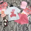 T-shirt per bambini di moda di design di lusso Gonna corta moda Giacca di moda britannica marca estate tesori per bambini ragazze cotone di lusso Gonna con cappuccio bambino Dhgate