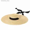 Chapéus de aba larga Bucket Chapéus Verão grande chapéu de palha de trigo natural Senhoras feitas à mão chapéu de sol de praia de aba larga Elegante top plano longo laço de fita chapéu de sol Q240312