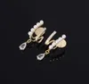 2024 Stud Stud Earrings Fashion Double-layer Pearl Mosquito Coil Ear Clip Water Drop Temperament Simple And Painless Wholesale Pearl earrings