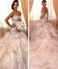 2020 Luxe Diamanten Zeemeermin Trouwjurken Robe De Mariage Parels Kanten Corset Top Tiered Ruches Tule Arabische Bruidsjurken Cathed6723039